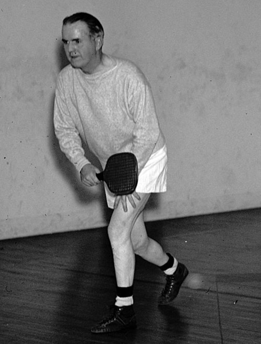 Emmet O'Neal playing paddle ball at the U.S. House Gym.